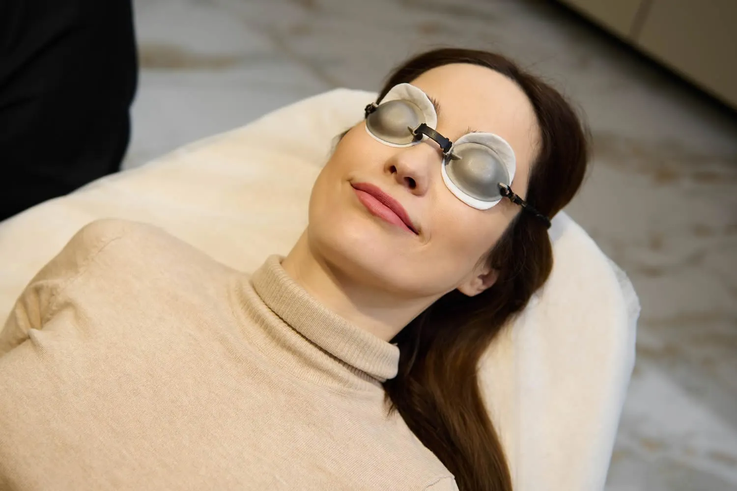 woma-getting-laser-treatment-at-cosmetic-dermatology-office